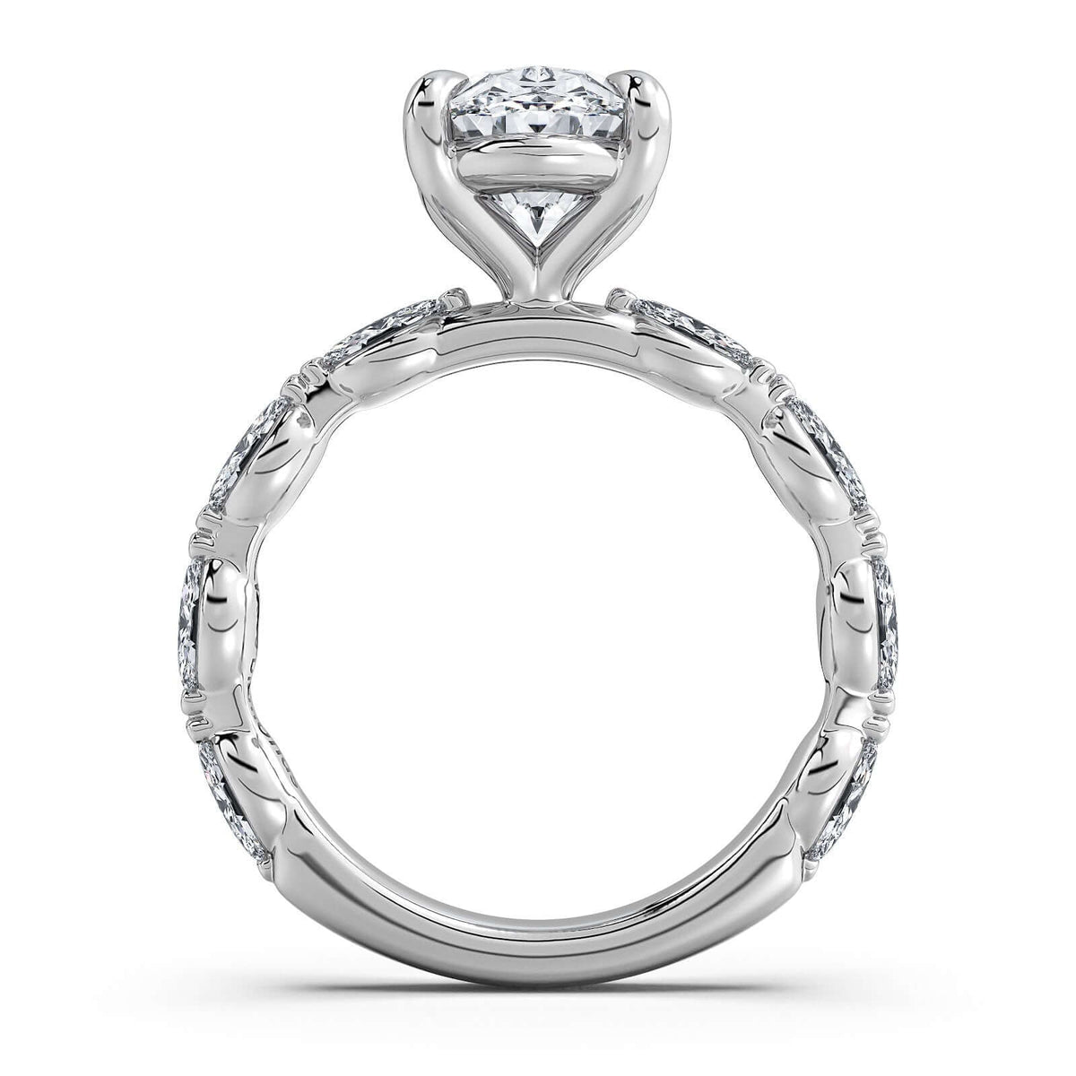 White Gold Oval Diamond Engagement Ring with Marquise Side Stone Band Profile View | Waco Diamonds Is Located In Waco, TX | Central Texas' #1 Engagement Ring Store With Lifetime Warranty