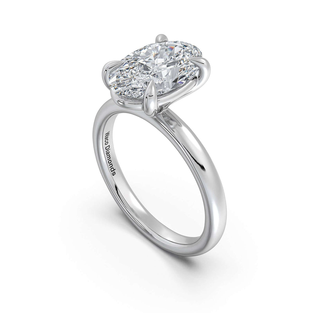 White Gold Oval Diamond Engagement Ring with Solitaire Band Side Profile | Waco Diamonds Is Located In Waco, TX | Central Texas' #1 Engagement Ring Store With Lifetime Warranty