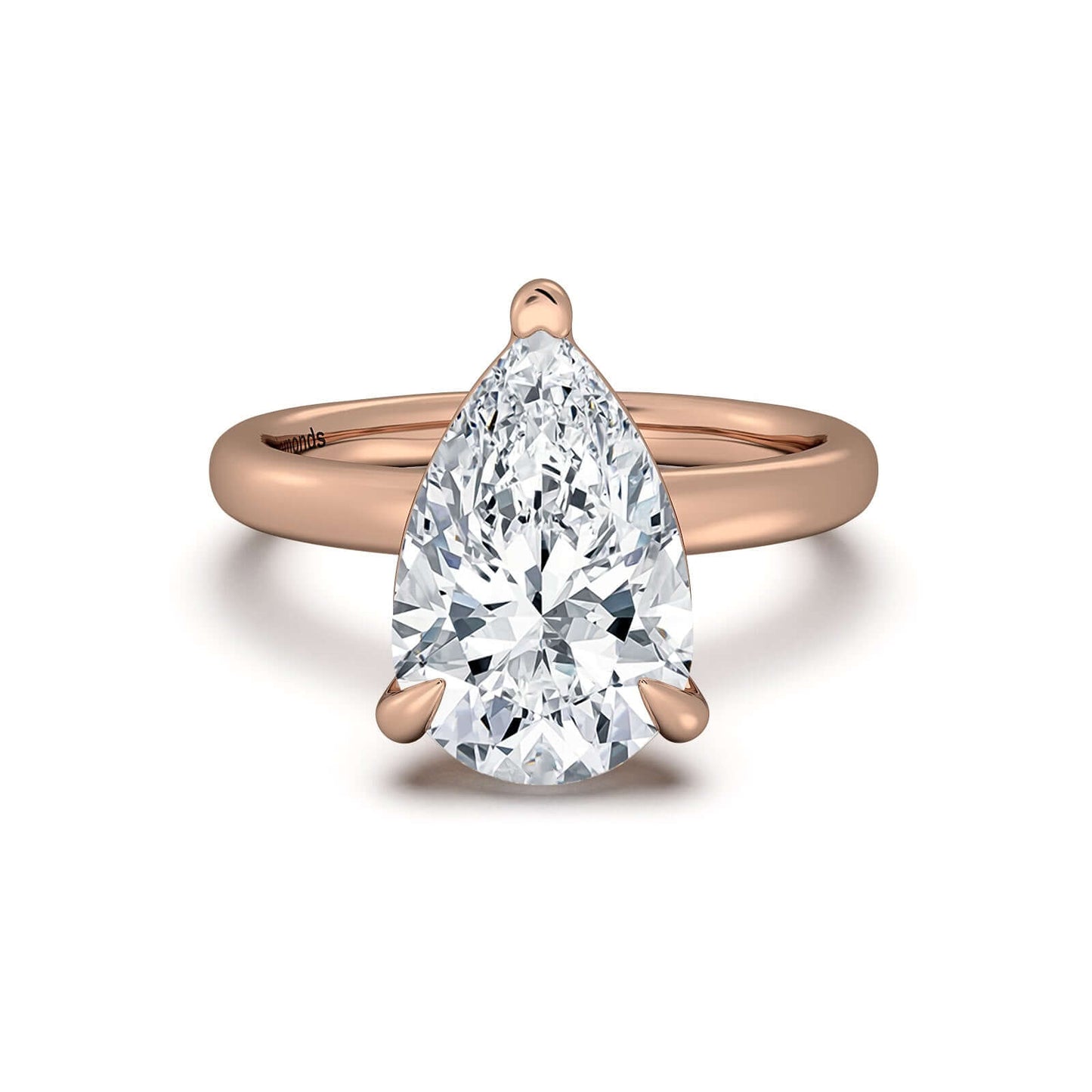 Rose Gold Pear Diamond Engagement Ring with Solitaire Band | Waco Diamonds Is Located In Waco, TX | Central Texas' #1 Engagement Ring Store With Lifetime Warranty