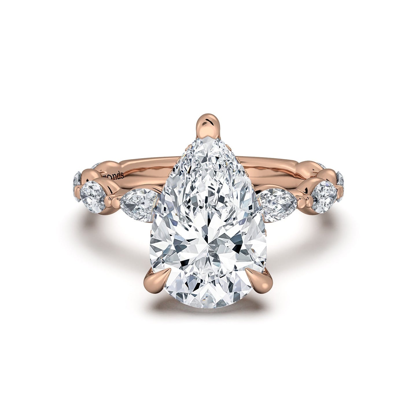 Rose Gold Pear Diamond Engagement Ring with Marquise Side Stone Band | Waco Diamonds Is Located In Waco, TX | Central Texas' #1 Engagement Ring Store With Lifetime Warranty