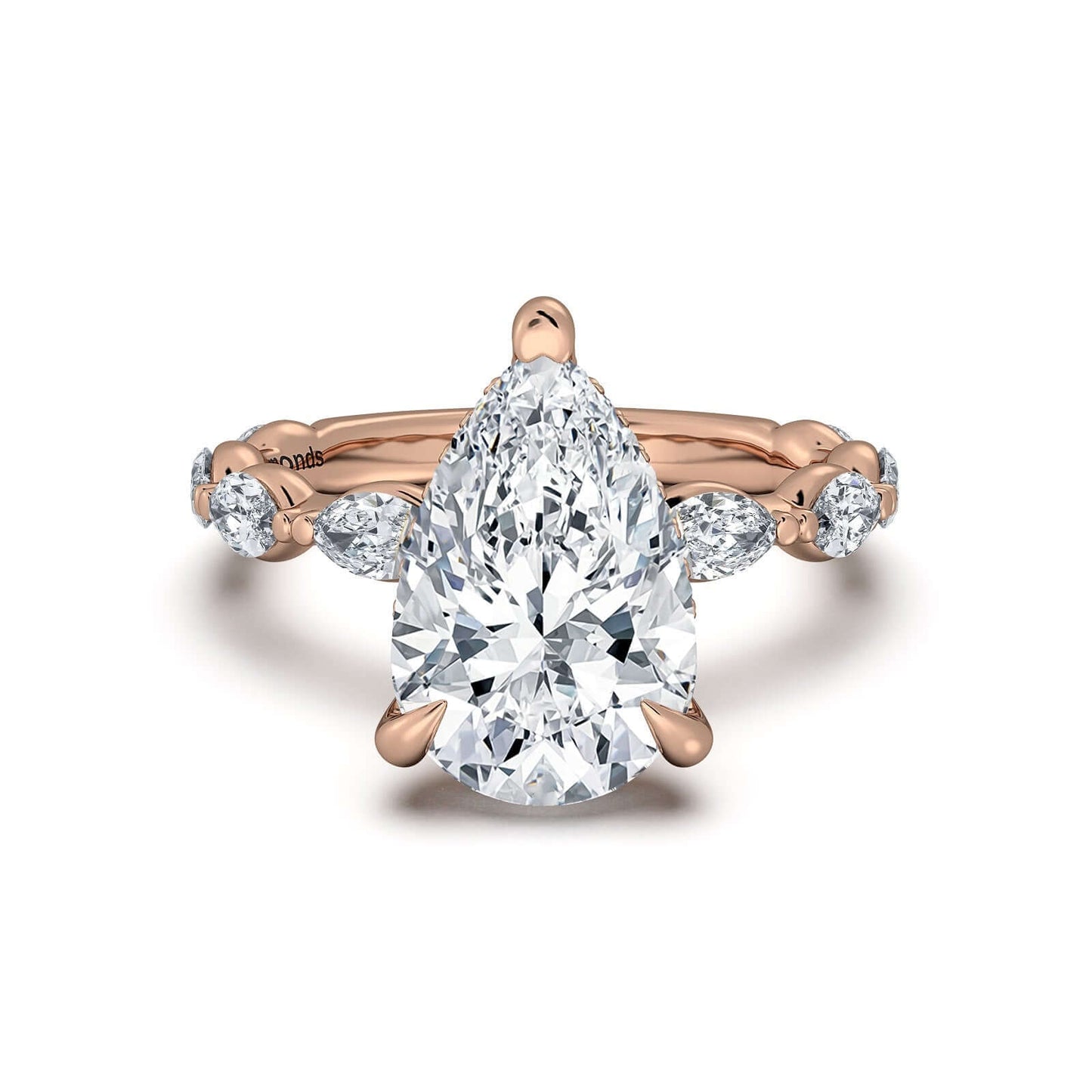 Rose Gold Pear Diamond Engagement Ring with Marquise Side Stone Band | Waco Diamonds Is Located In Waco, TX | Central Texas' #1 Engagement Ring Store With Lifetime Warranty