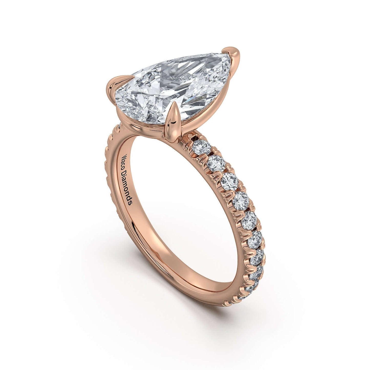 Rose Gold Pear Diamond Engagement Ring with Pave Band | Waco Diamonds Is Located In Waco, TX | Central Texas' #1 Engagement Ring Store With Lifetime Warranty