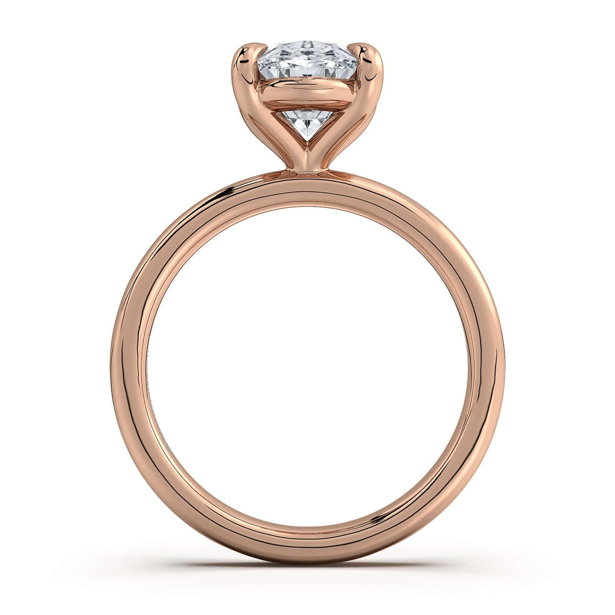 Rose Gold Oval Diamond Engagement Ring with Solitaire Band Profile View | Waco Diamonds Is Located In Waco, TX | Central Texas' #1 Engagement Ring Store With Lifetime Warranty