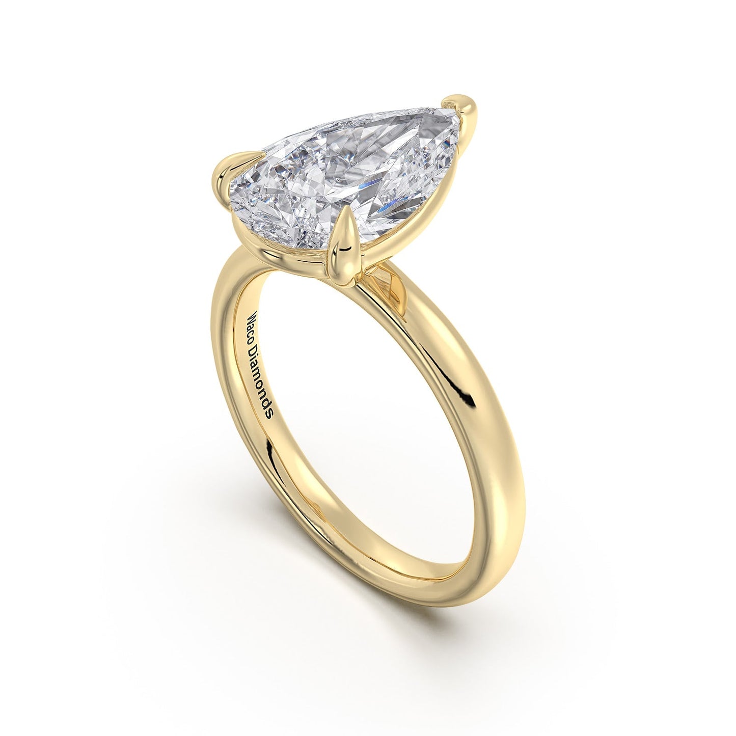 Yellow Gold Pear Diamond Engagement Ring with Solitaire Band Side Profile | Waco Diamonds Is Located In Waco, TX | Central Texas' #1 Engagement Ring Store With Lifetime Warranty