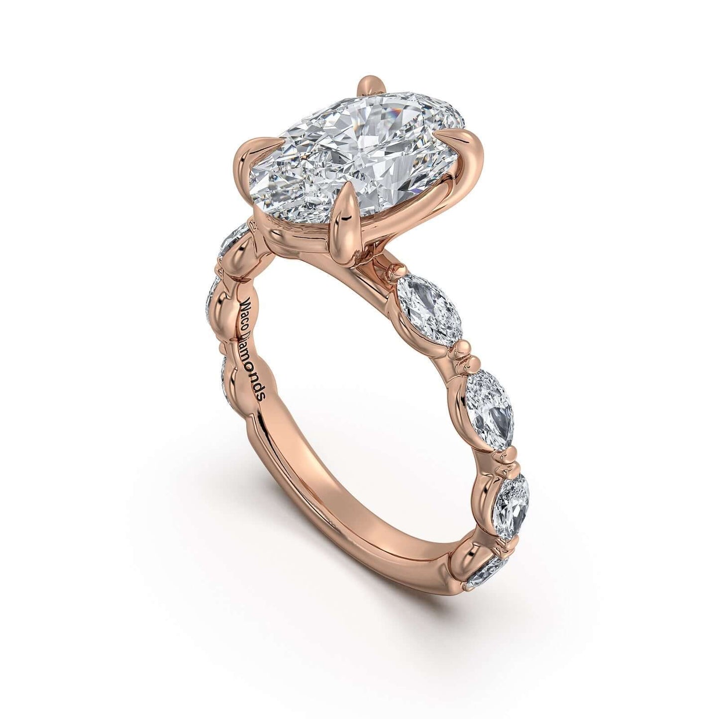 Rose Gold Oval Diamond Engagement Ring with Marquise Side Stone Band | Waco Diamonds Is Located In Waco, TX | Central Texas' #1 Engagement Ring Store With Lifetime Warranty