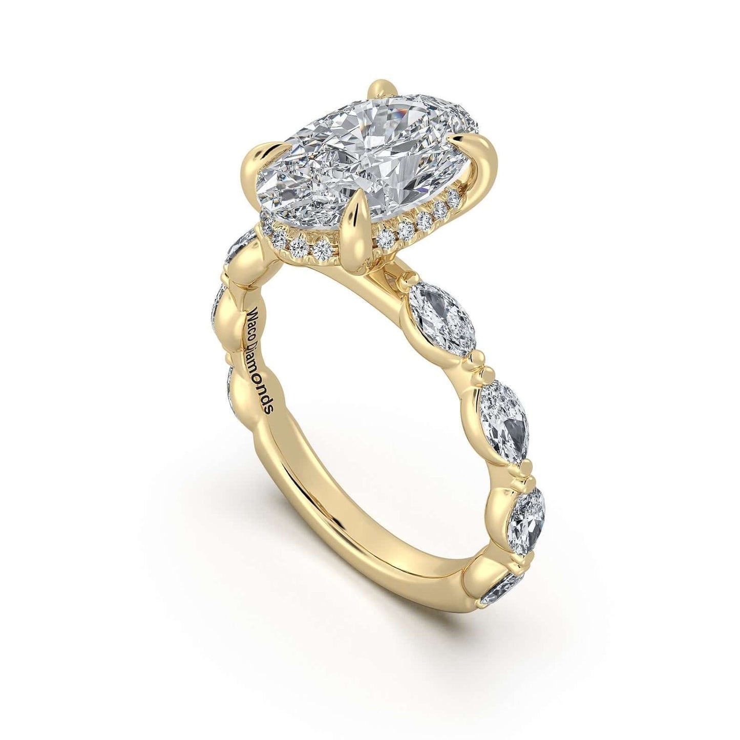 Yellow Gold Oval Diamond Engagement Ring with Marquise Side Stone Band | Waco Diamonds Is Located In Waco, TX | Central Texas' #1 Engagement Ring Store With Lifetime Warranty
