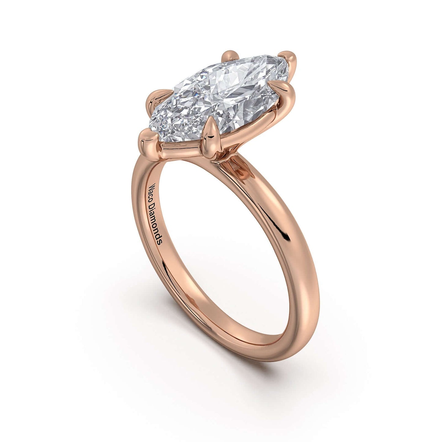 Rose Gold Marquise Diamond Engagement Ring with Solitaire Band | Waco Diamonds Is Located In Waco, TX | Central Texas' #1 Engagement Ring Store With Lifetime Warranty