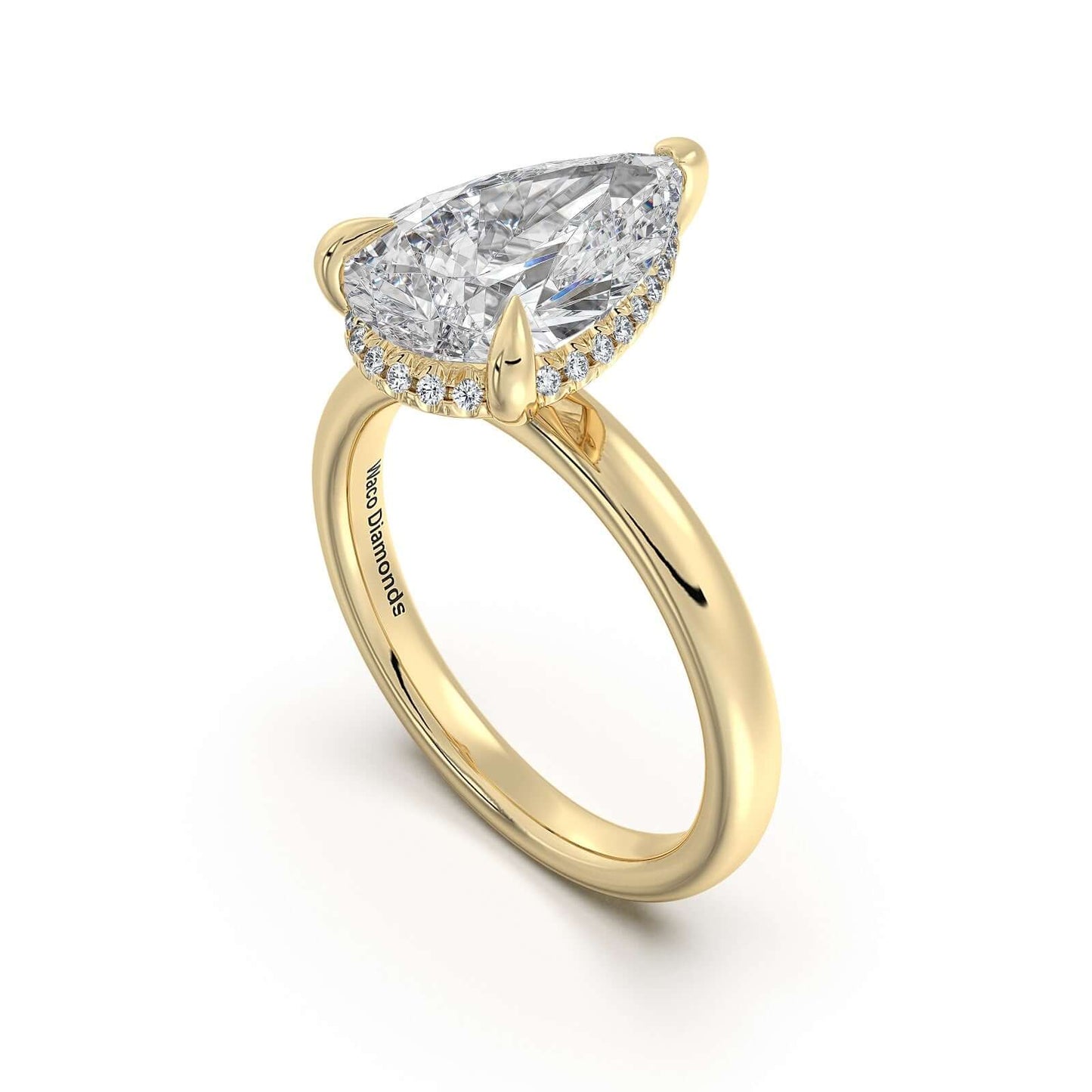 Yellow Gold Pear Diamond Engagement Ring with Solitaire Band | Waco Diamonds Is Located In Waco, TX | Central Texas' #1 Engagement Ring Store With Lifetime Warranty