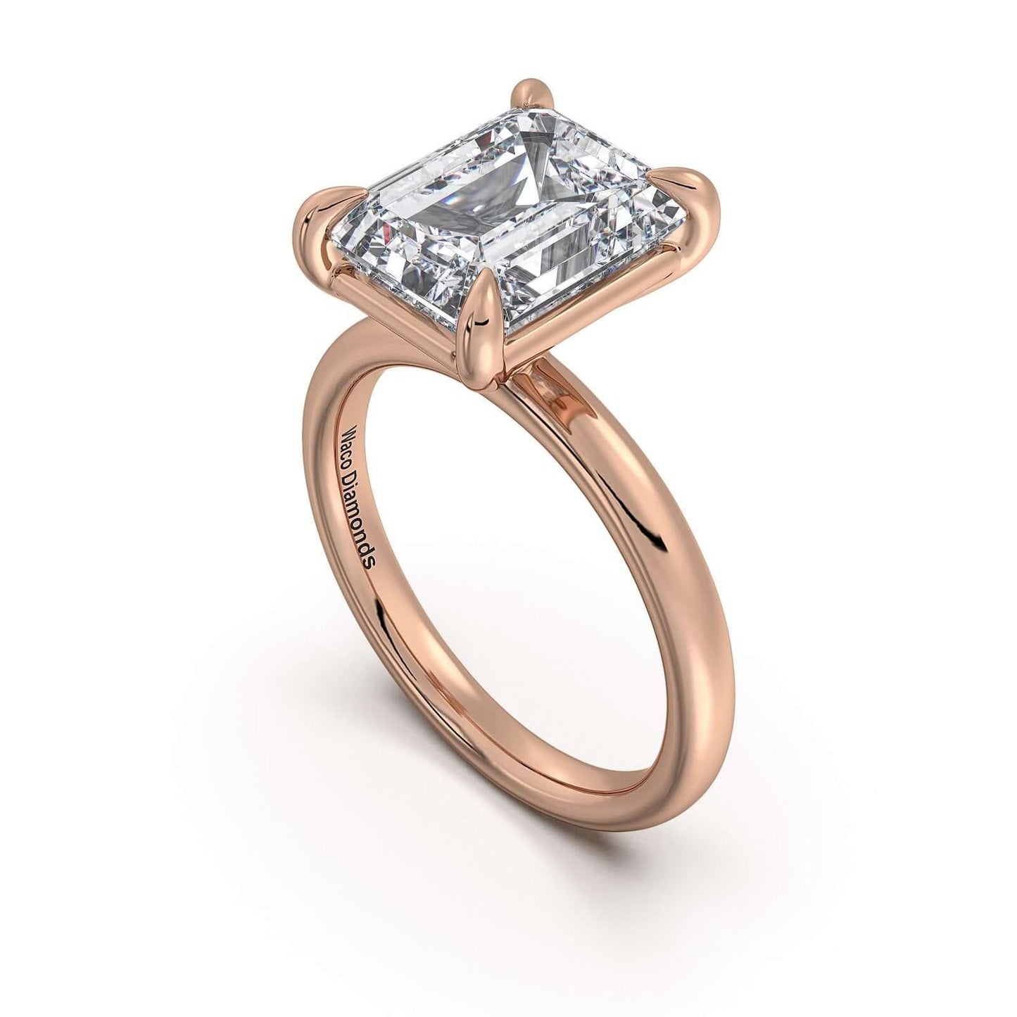 Rose Gold Emerald Diamond Engagement Ring with Solitaire Band | Waco Diamonds Is Located In Waco, TX | Central Texas' #1 Engagement Ring Store With Lifetime Warranty