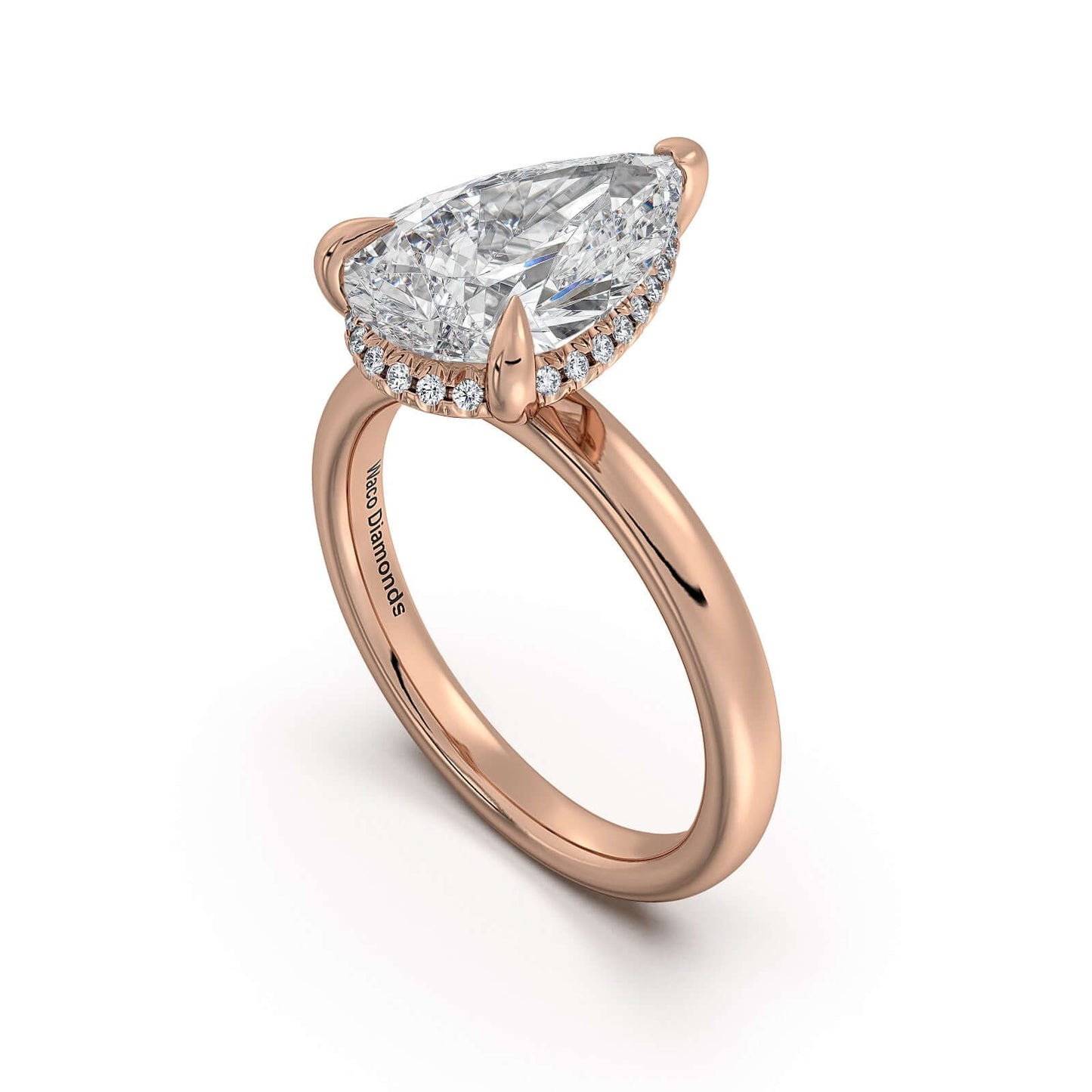 Rose Gold Pear Diamond Engagement Ring with Solitaire Band | Waco Diamonds Is Located In Waco, TX | Central Texas' #1 Engagement Ring Store With Lifetime Warranty