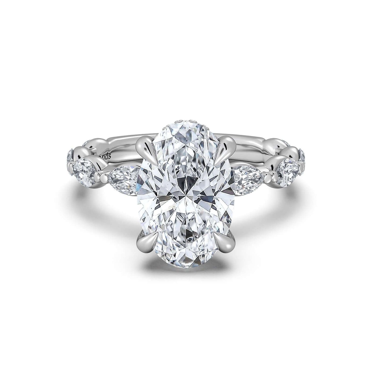 White Gold Oval Diamond Engagement Ring with Marquise Side Stone Band | Waco Diamonds Is Located In Waco, TX | Central Texas' #1 Engagement Ring Store With Lifetime Warranty
