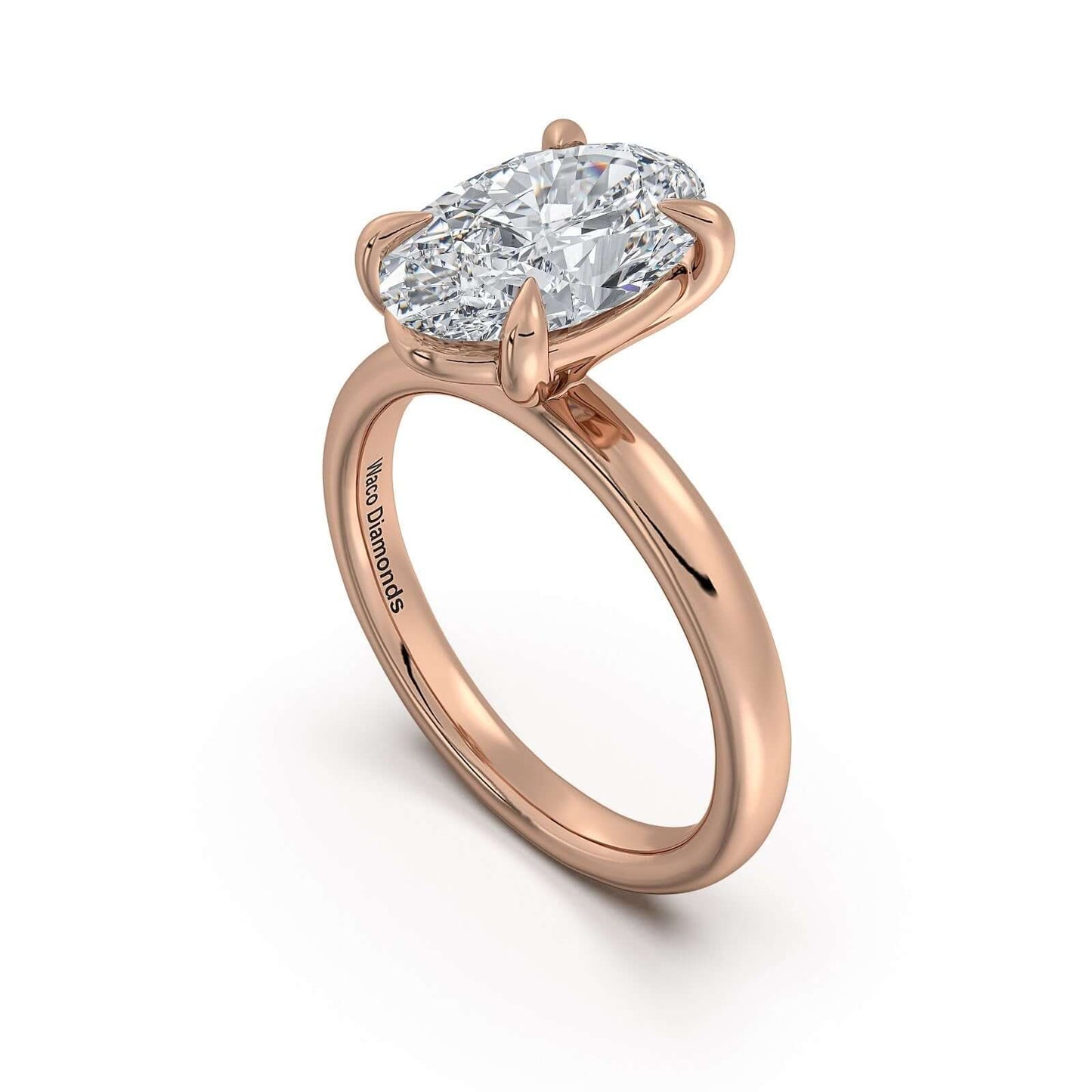 Rose Gold Oval Diamond Engagement Ring with Solitaire Band | Waco Diamonds Is Located In Waco, TX | Central Texas' #1 Engagement Ring Store With Lifetime Warranty