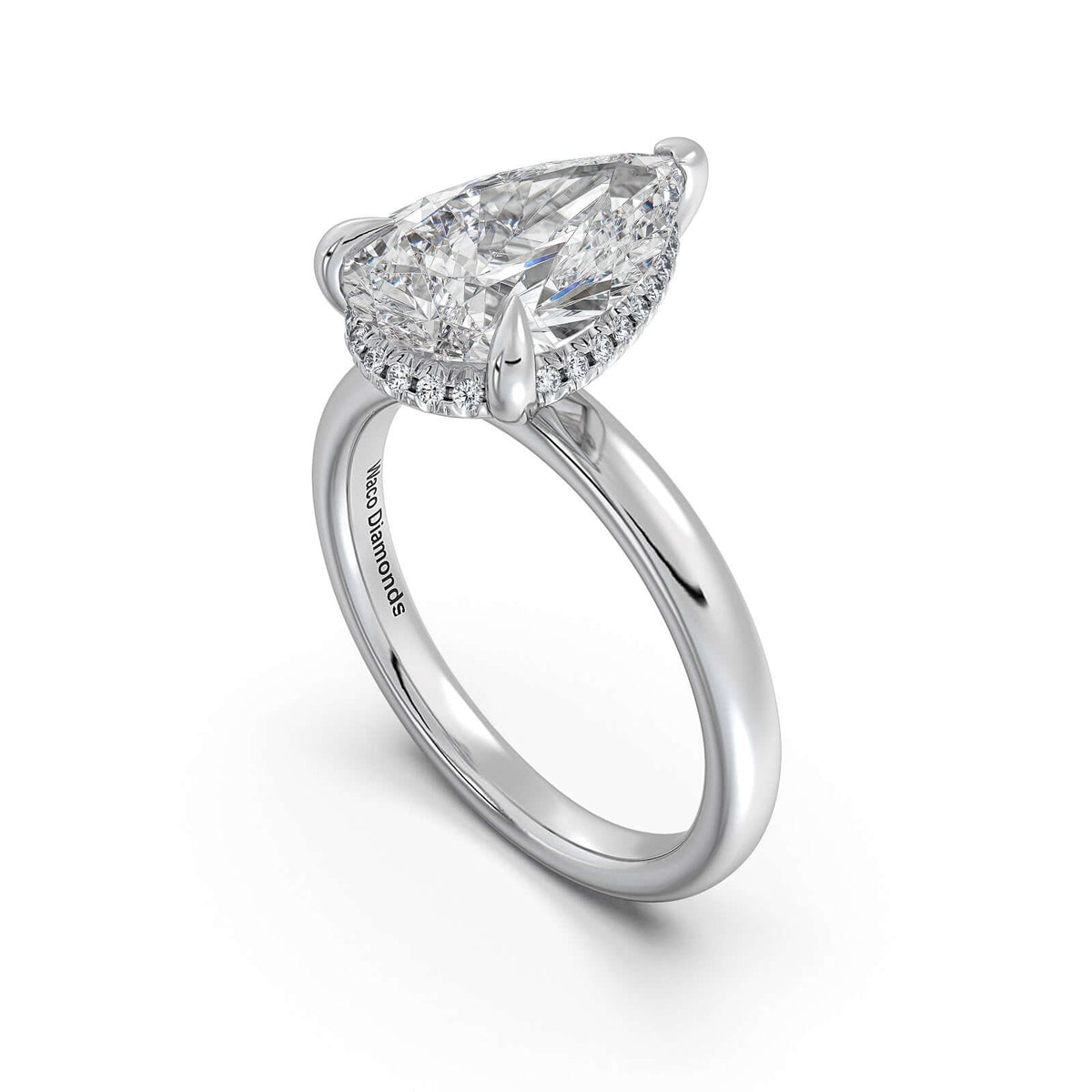 White Gold Pear Diamond Engagement Ring with Solitaire Band Side Profile | Waco Diamonds Is Located In Waco, TX | Central Texas' #1 Engagement Ring Store With Lifetime Warranty