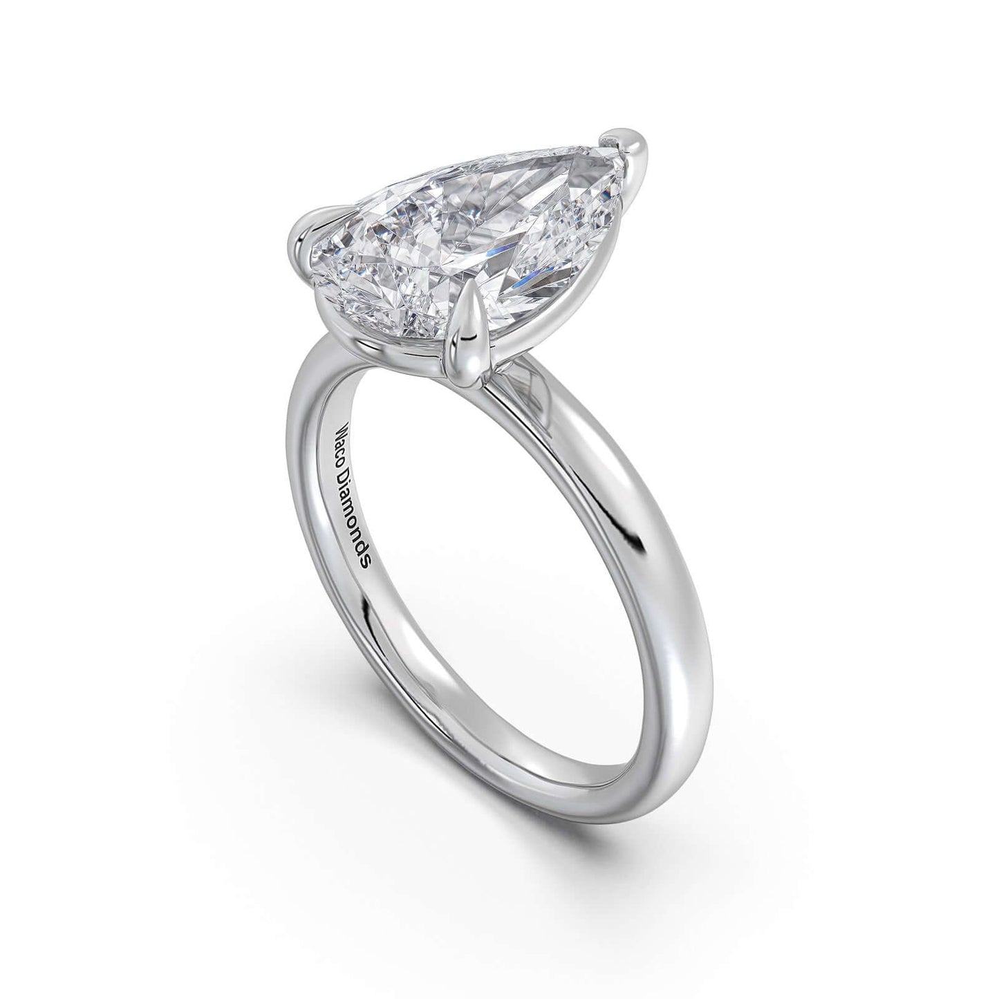 White Gold Pear Diamond Engagement Ring with Solitaire Band | Waco Diamonds Is Located In Waco, TX | Central Texas' #1 Engagement Ring Store With Lifetime Warranty