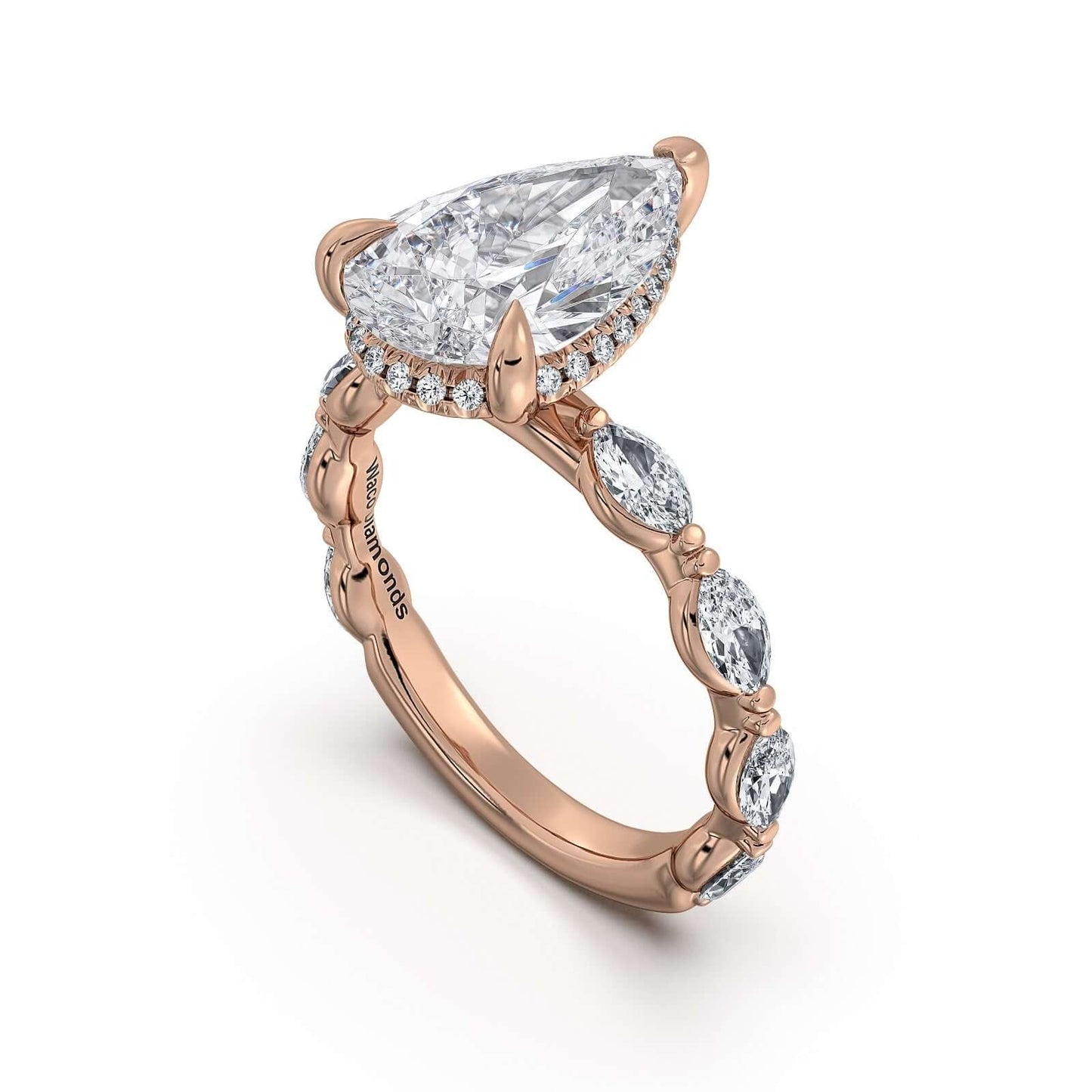 Rose Gold Pear Diamond Engagement Ring with Marquise Side Stone Band | Waco Diamonds Is Located In Waco, TX | Central Texas' #1 Engagement Ring Store With Lifetime Warranty