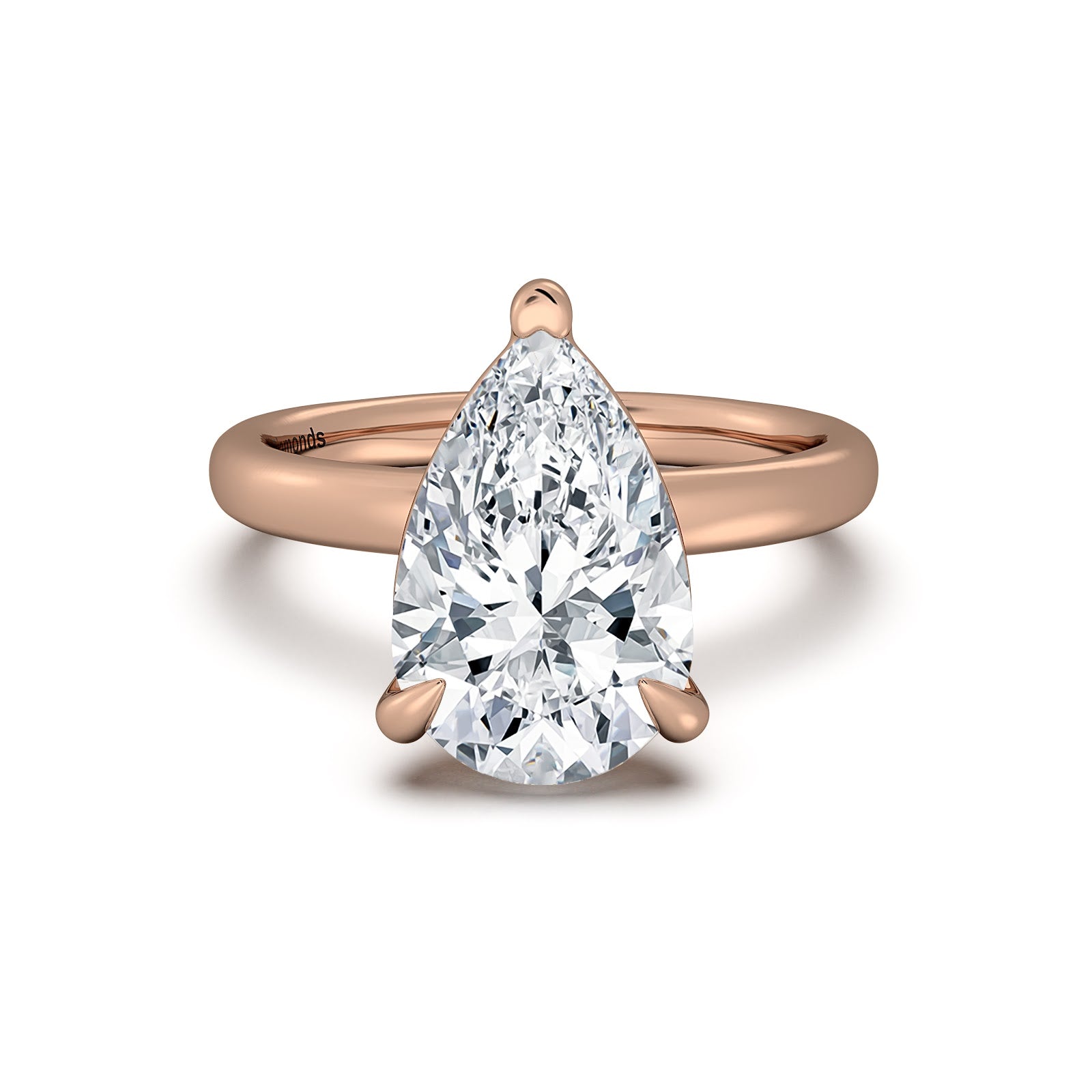 Rose Gold Pear Diamond Engagement Ring with Solitaire Band | Waco Diamonds Is Located In Waco, TX | Central Texas' #1 Engagement Ring Store With Lifetime Warranty