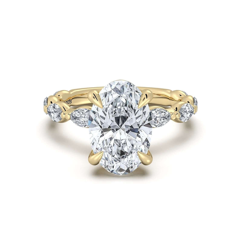 Yellow Gold Oval Diamond Engagement Ring with Marquise Side Stone Band | Waco Diamonds Is Located In Waco, TX | Central Texas' #1 Engagement Ring Store With Lifetime Warranty