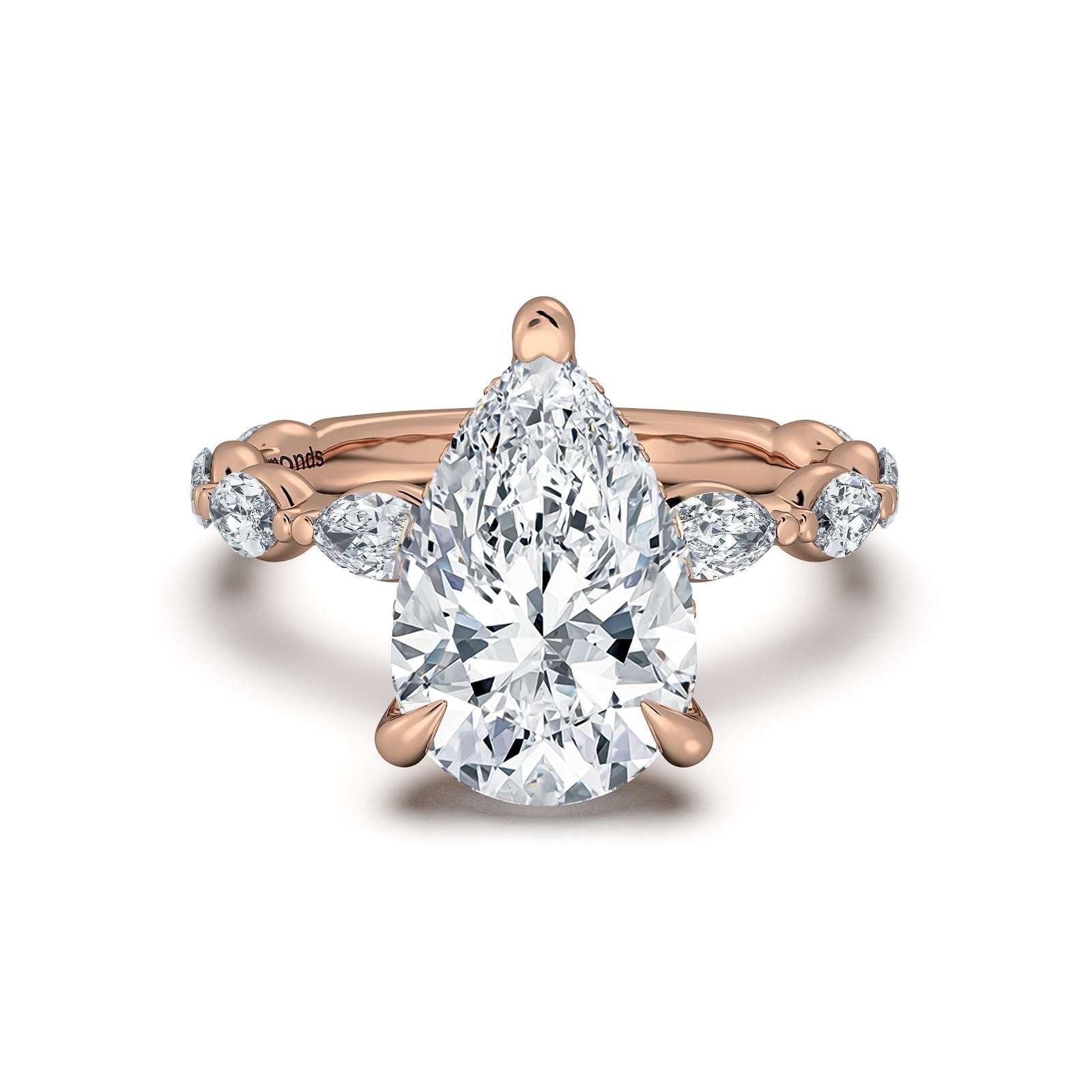 Rose Gold Pear Diamond Engagement Ring with Marquise Side Stone Band | Waco Diamonds Is Located In Waco, TX | Central Texas' #1 Engagement Ring Store With Lifetime Warranty