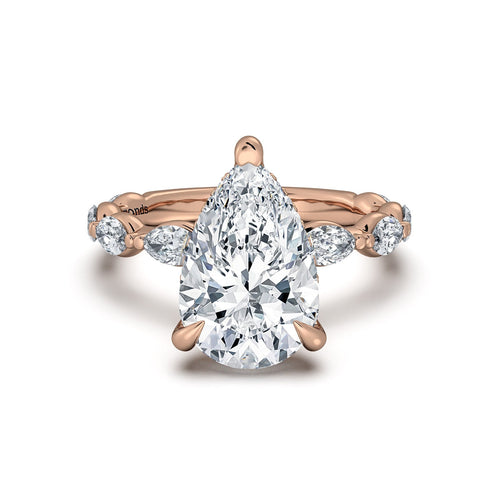 Load image 1 in gallery view. Rose Gold Pear Diamond Engagement Ring with Marquise Side Stone Band | Waco Diamonds Is Located In Waco, TX | Central Texas' #1 Engagement Ring Store With Lifetime Warranty