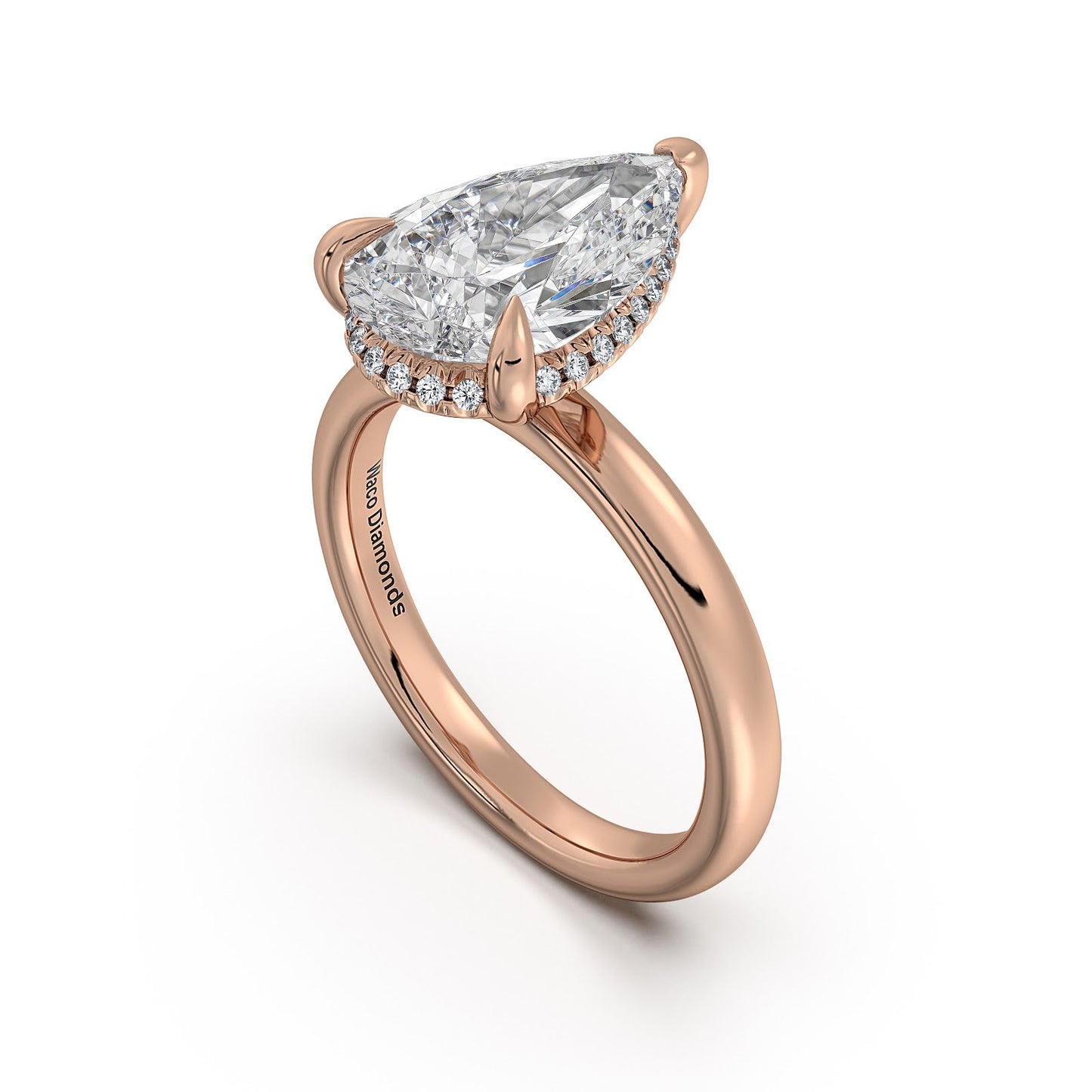 Rose Gold Pear Diamond Engagement Ring with Solitaire Band Side Profile | Waco Diamonds Is Located In Waco, TX | Central Texas' #1 Engagement Ring Store With Lifetime Warranty