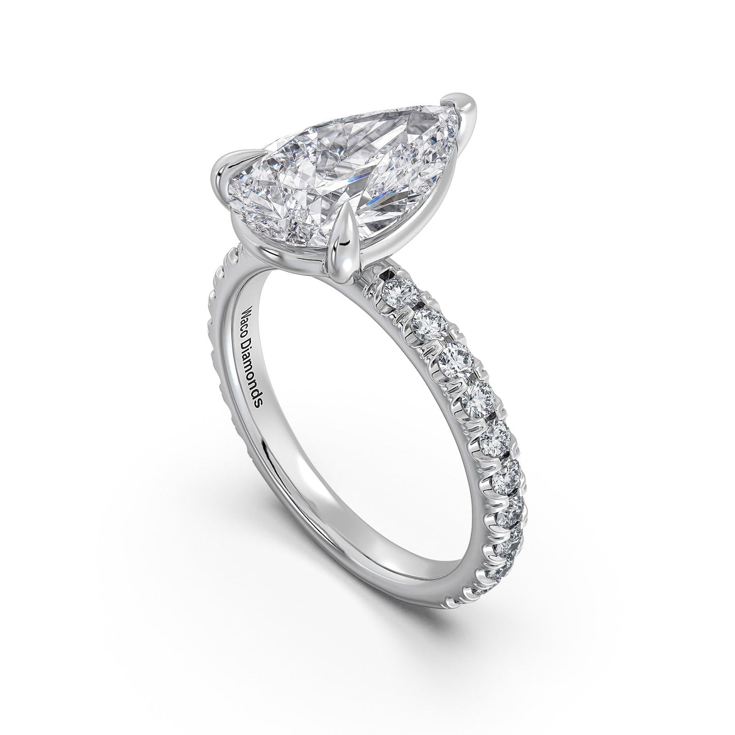 White Gold Pear Diamond Engagement Ring with Pave Band Side Profile | Waco Diamonds Is Located In Waco, TX | Central Texas' #1 Engagement Ring Store With Lifetime Warranty
