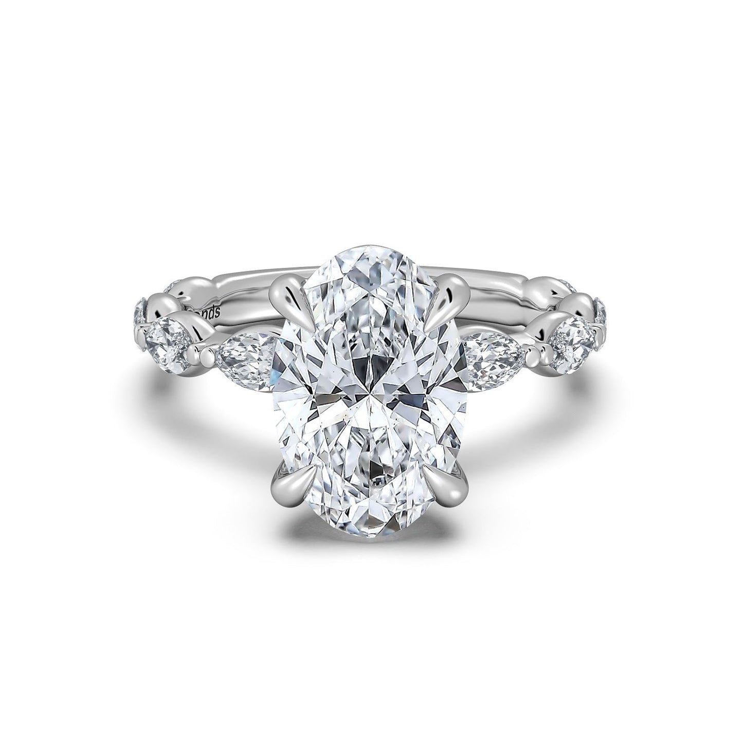 White Gold Oval Diamond Engagement Ring with Marquise Side Stone Band | Waco Diamonds Is Located In Waco, TX | Central Texas' #1 Engagement Ring Store With Lifetime Warranty