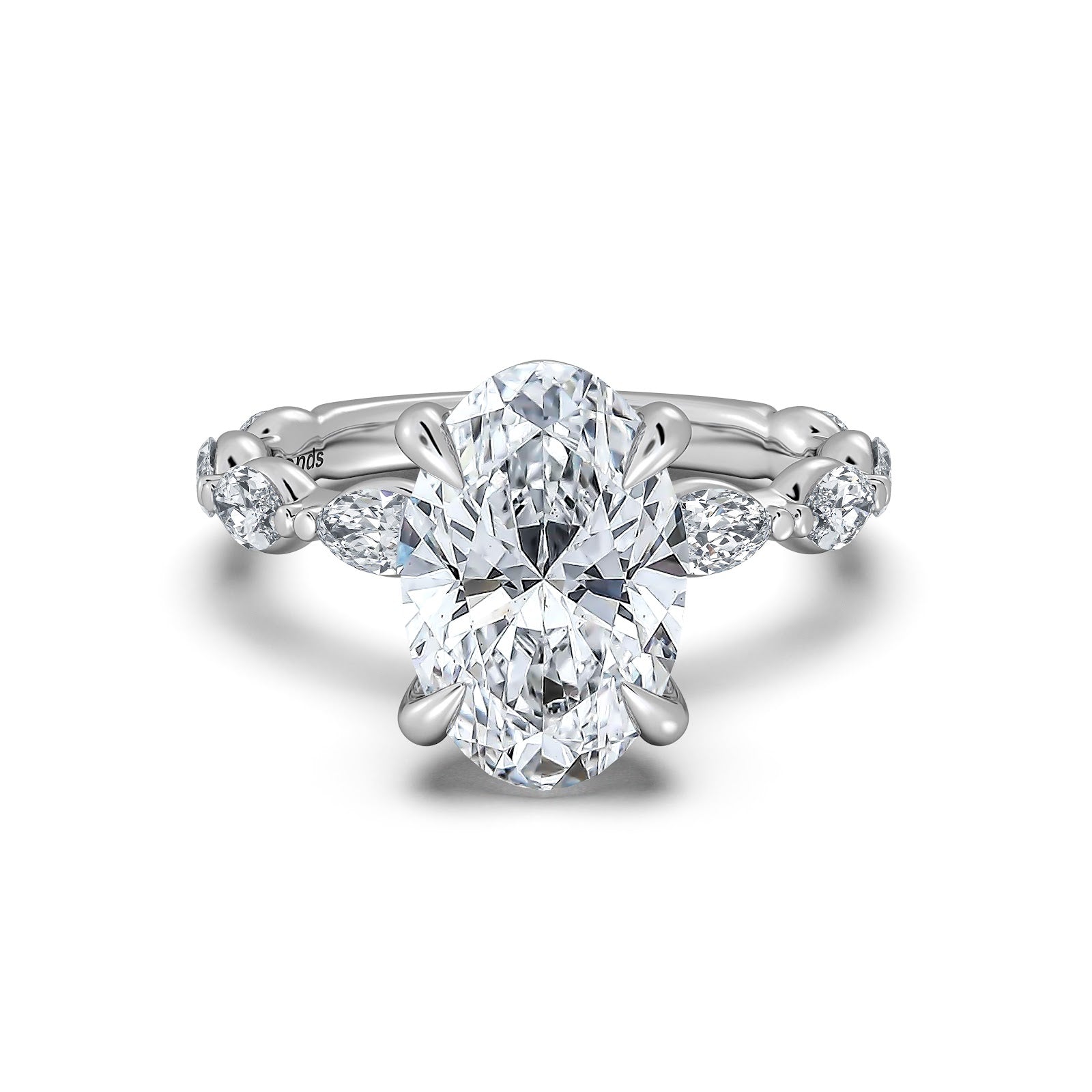 White Gold Oval Diamond Engagement Ring with Marquise Side Stone Band | Waco Diamonds Is Located In Waco, TX | Central Texas' #1 Engagement Ring Store With Lifetime Warranty