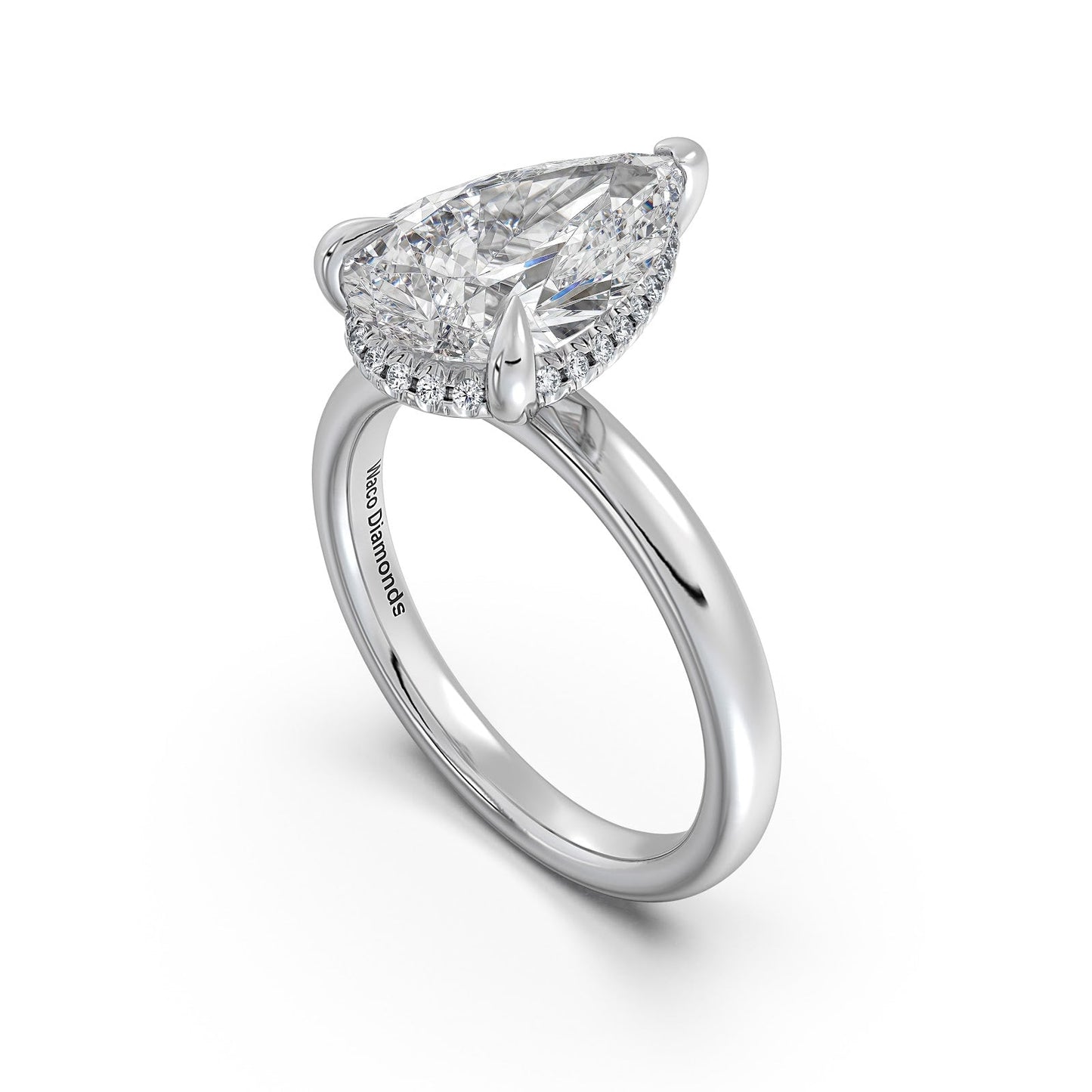 White Gold Pear Diamond Engagement Ring with Solitaire Band Side Profile | Waco Diamonds Is Located In Waco, TX | Central Texas' #1 Engagement Ring Store With Lifetime Warranty